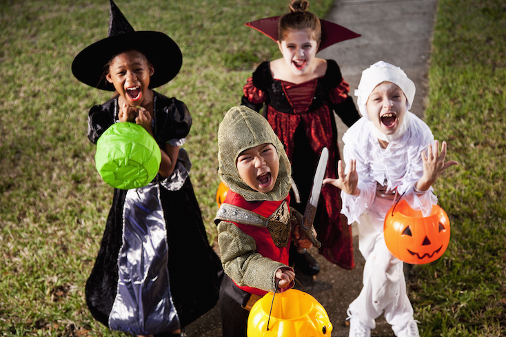 Stay Safe while Trick or Treating Kids dressed up yelling trick or treat